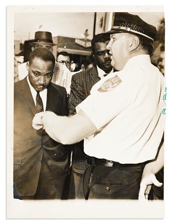 (CIVIL RIGHTS.) Group of 41 press photos of civil rights leaders, riots, protests, and more.